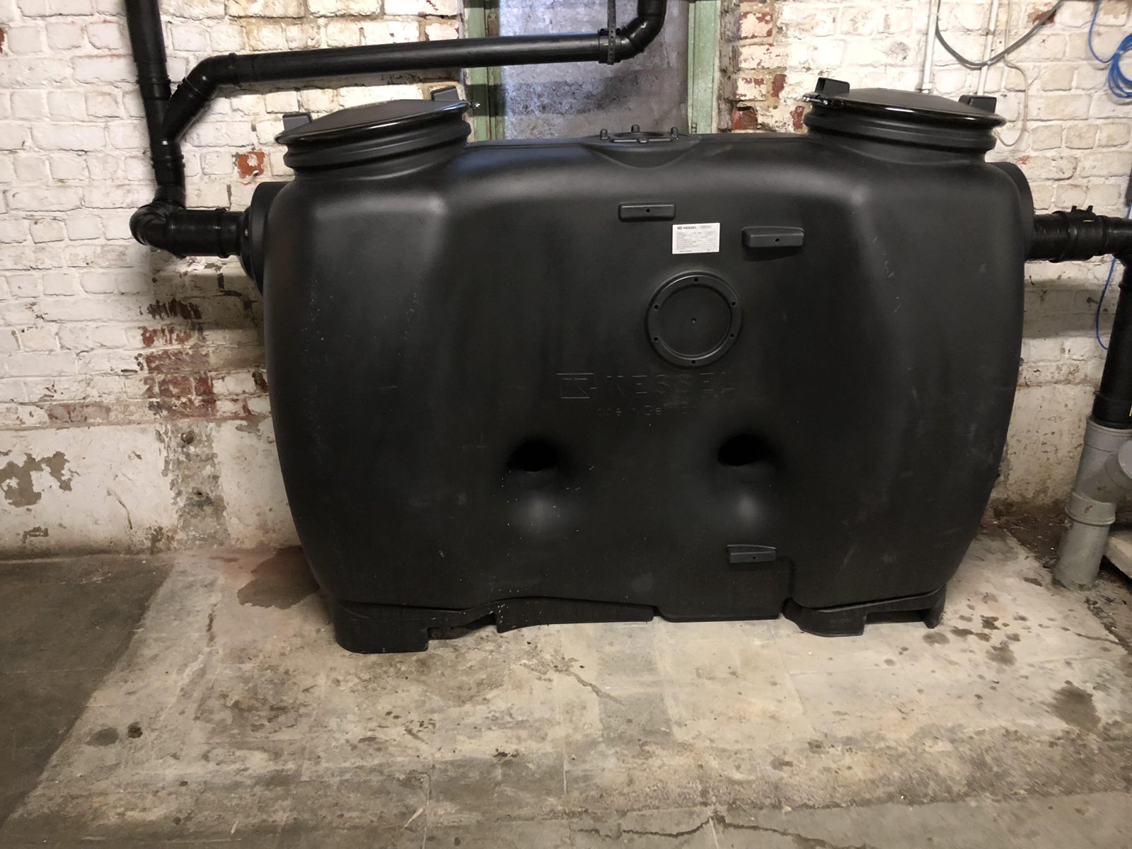 Séparateur de graisses avec alarme de trop-plein